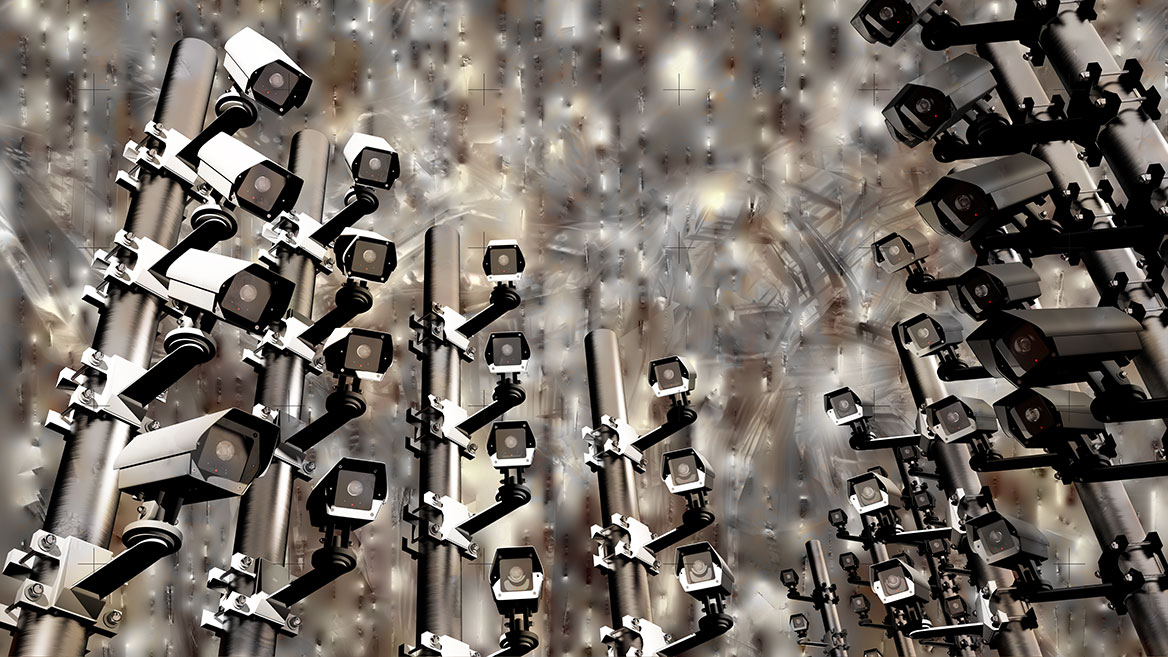 Surveillance cameras are lined up one behind the other. All lenses are aligned with the viewer.